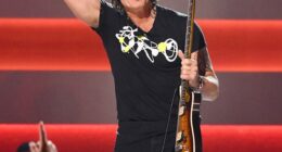 Keith Urban stunned the audience at the CMA Awards in Nashville on Monday by appearing onstage for a surprise duet with hostess Lainey Wilson