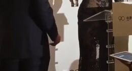 America's very glamorous ambassador to Greece, Kimberly Guilfoyle, could hardly move in a skintight dress as she attended a Thanksgiving dinner in Athens last night