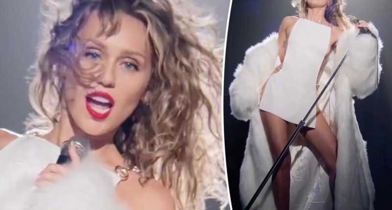 Miley Cyrus wears micro mini cutout custom white Gucci dress in her latest Maybelline New York campaign