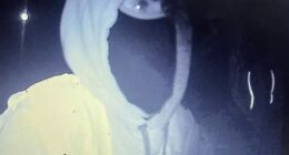 Hooded men were filmed with their 'power tools' on a hidden camera as they removed the banners at the De Luci Fish roundabout in Erith, London