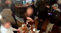 CCTV captured the chillingly slick theft as a group sat eating and drinking, blissfully unaware they were being targeted.