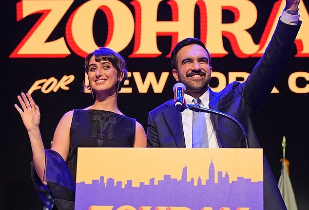 Sporting her favoured gold hoop earrings and a black lace ensemble, Rama Duwaji, the 28-year-old wife of new New York mayor Zohran Mamdani, has become the youngest ever First Lady of New York City, after her husband took more than 50 per cent of the vote in this week's mayoral elections (Pictured at Brooklyn Paramount Theate)
