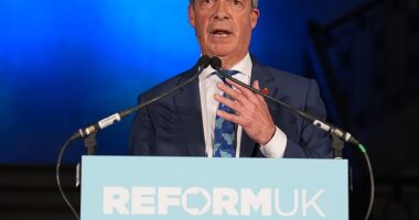 Nigel Farage warns Britain is on the verge of financial collapse with 'extraordinary' debt mountain... as he admits Labour chaos will delay tax cuts hopes