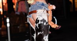 Olivia Attwood, 34, cheekily displayed her bottom as she dressed up as Toy Story's Jessie at Heidi Klum 's legendary Halloween party in New York on Friday