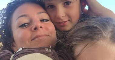 Family psychologist Dr Jo Stuart is pictured here with her two young children. She told the Daily Mail that modern employment requires parents to 'function like machines' and cautioned carers to implement rest periods or risk dire consequences to their mental health