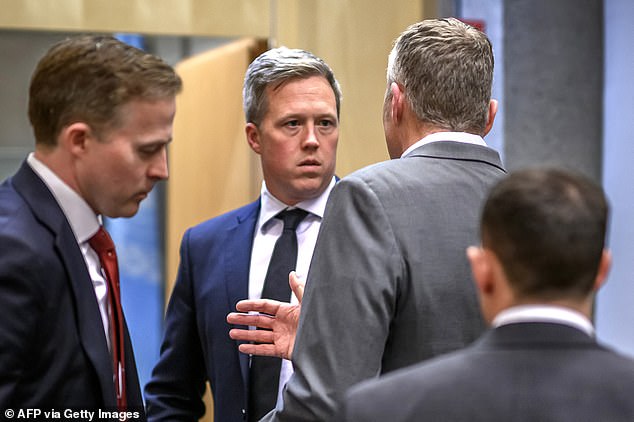 US Secretary of the Army Daniel Driscoll speaks with US staff after a closed-door talks with the Ukrainian delegation on a US plan to end the war in Ukraine at the US Mission in Geneva, on November 23