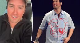 Pop star hospitalized after slicing knee open on stage