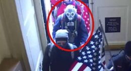 Wilson, seen here in a gasmask as he entered the Capitol, was pardoned again by the president on Friday