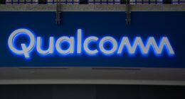 Qualcomm takes a big tax charge that hits earnings, and the stock falls