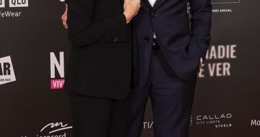 Richard Gere and his wife Alejandra Silva cosied up at the premiere of their short documentary film What Nobody Wants To See in Madrid on Monday evening