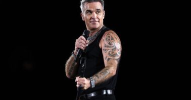 Robbie Williams has admitted to a disgusting act he does on stage while performing for thousands of fans