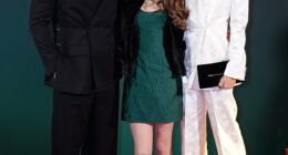 Robbie Williams and wife Ayda Field looked happier than ever as they posed with their rarely seen daughter Teddy at the Tinsel Town premiere in London on Thursday