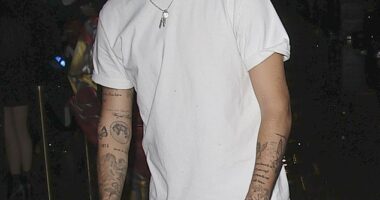 Romeo Beckham, 23, cut a casual figure in a white T-shirt and jeans as he left 77 Marylebone, a Naomi Campbell-hosted Halloween party in London on Friday