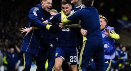 Kenny McLean is mobbed after grabbing a stunning fourth and final goal at Hampden