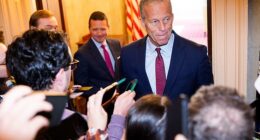 Senate Majority Leader John Thune (R-SD) speaks to members of the press as he heads to his office in the Capitol Building on November 8, 2025 in Washington, DC