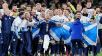 Steve Clarke enjoys a magical moment with his players and staff at Hampden on Tuesday
