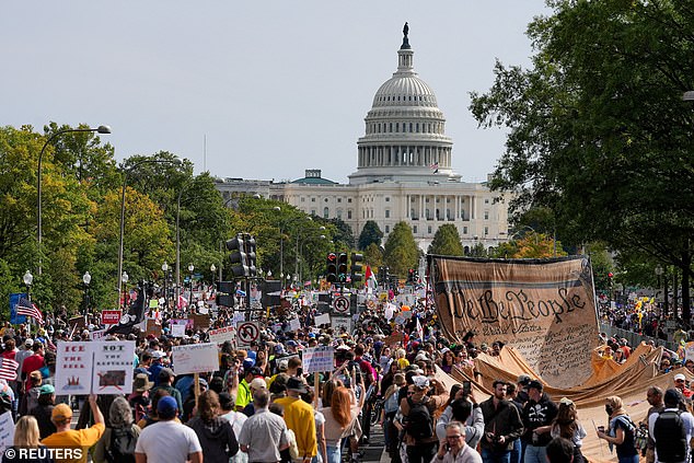 Demonstrators gather near the U.S. Capitol building during a "No Kings" protest against President Donald Trump's policies, in Washington, D.C., October 18, 2025