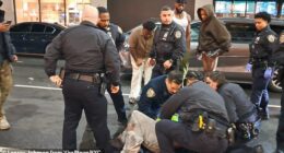 Police officers can be seen treating Kris Boyd in the street in shocking new footage