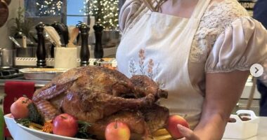 Jennifer Lopez showed off her cooking skills as she held up a tray of a perfectly roasted turkey while celebrating Thanksgiving on Thursday