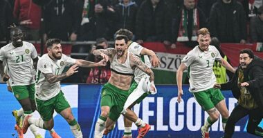 Troy Parrott hit a stunning hat-trick to help Ireland secure a World Cup play-off place in a dramatic qualifier at the Puskas Arena