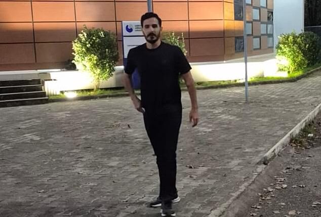 Tinder Swindler Shimon Hayut strolling out of prison following his dramatic release