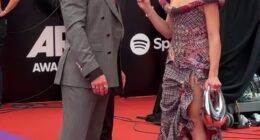 Abbie Chatfield brought the heat to the ARIA Awards red carpet on Wednesday - but it a tense moment between her and her boyfriend Adam Hyde really turned heads. Both pictured