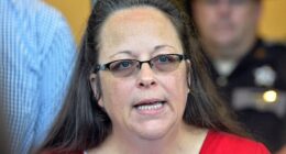 Rowan County Clerk Kim Davis makes a statement to the media at the front door of the Rowan County Judicial Center in Morehead, Kentucky, in 2015