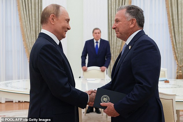 Russia's President Vladimir Putin greets US Special Envoy Steve Witkoff prior to their talks in Moscow on August 6