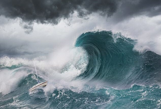 Mega tsunamis can be triggered by events such as landslides or volcanic island collapses. Scientists believe an asteroid impact triggered a mile-high mega-tsunami during the time of the dinosaurs (Stock Image)