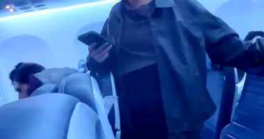 A blonde woman was seen repeatedly shouting a vulgar slur at airline crew members and passengers while on board a United Airlines flight on November 9 in Newark, New Jersey