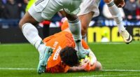 Auston Trusty kicks Jack Butland on the head during Sunday's chaotic Old Firm derby