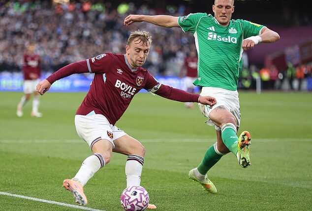 Dan Burn competes with Jarrod Bowen during the 3-1 defeat at West Ham on Sunday