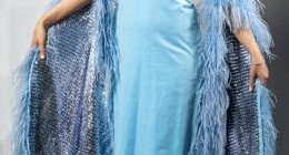 Cilla Black's iconic velvet ballgown is tried on by Daily Mail news reporter Katherine Lawton (pictured). Price at auction: £350-£550