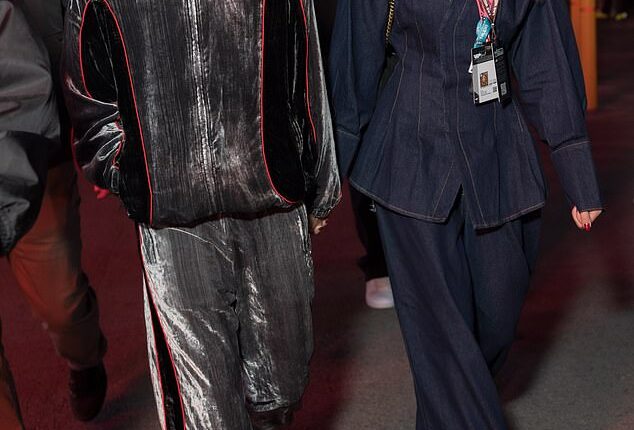 Louis Tomlinson and girlfriend Zara McDermott were quite literally in Paradise on Saturday during a rare joint appearance at the Las Vegas Grand Prix