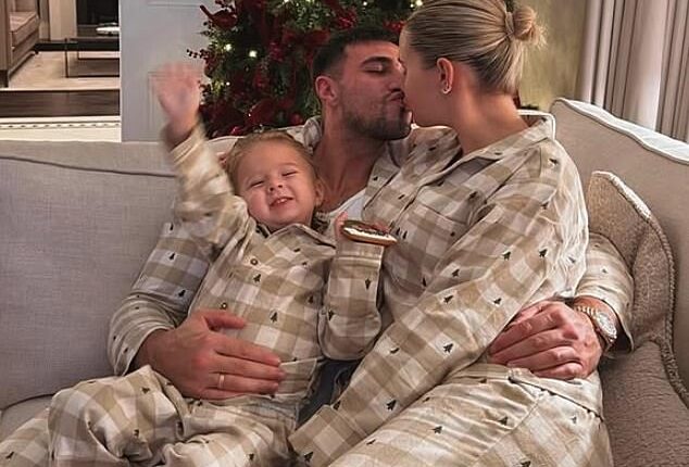 Molly-Mae Hague and Vogue Williams get passionate with their partners as they lead the celeb families enjoying Christmas in coordinating pyjamas