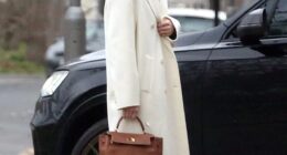 Holly Ramsay, 25, stunned in a white coat as she headed to Bath with her family ahead of her wedding to Adam Peaty amid his family feud