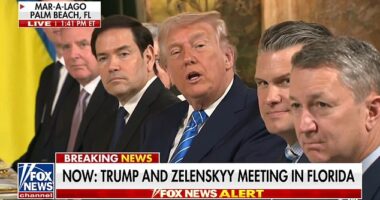 Awkward moment Trump stuns reporters into silence after asking if they would consider free lunch at Mar-a-Lago a 'bribe'