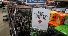 A sign urging shoppers to ¿Buy Canadian Instead¿ in a Canadian retailer. US bourbon has been hit hard by a Canadian backlash linked to tariffs.