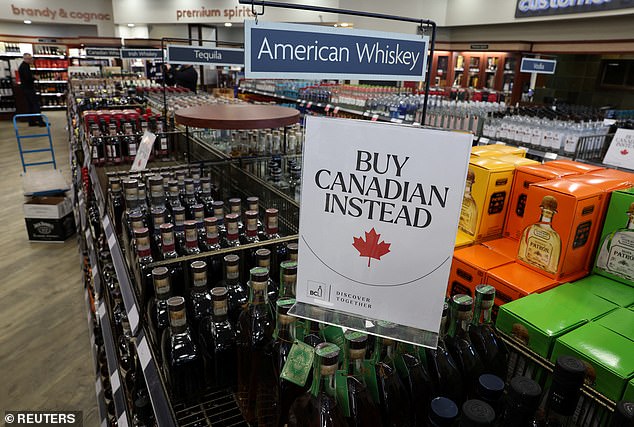 A sign urging shoppers to ¿Buy Canadian Instead¿ in a Canadian retailer. US bourbon has been hit hard by a Canadian backlash linked to tariffs.