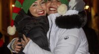 Sisters Lisi and Aura from Gran Canaria celebrate Hogmanay in Edinburgh, Scotland