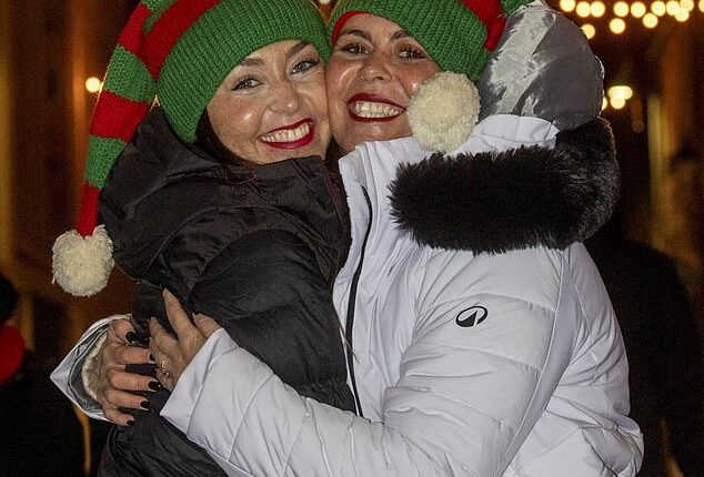 Sisters Lisi and Aura from Gran Canaria celebrate Hogmanay in Edinburgh, Scotland