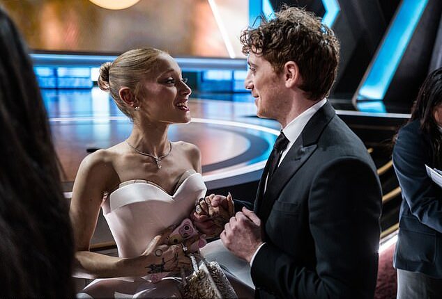 Ariana Grande's costar-turned-boyfriend Ethan Slater might look like he has a slim 5ft7in frame, but he's surprisingly ripped in a newly-released deleted scene from their hit film Wicked: For Good (pictured March 2)