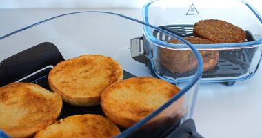 The Ninja Crispi has glass cooking containers with removable non-stick trays