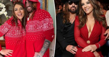 Billy Ray Cyrus and Elizabeth Hurley mark their first Christmas as a couple in matching onesie pajamas