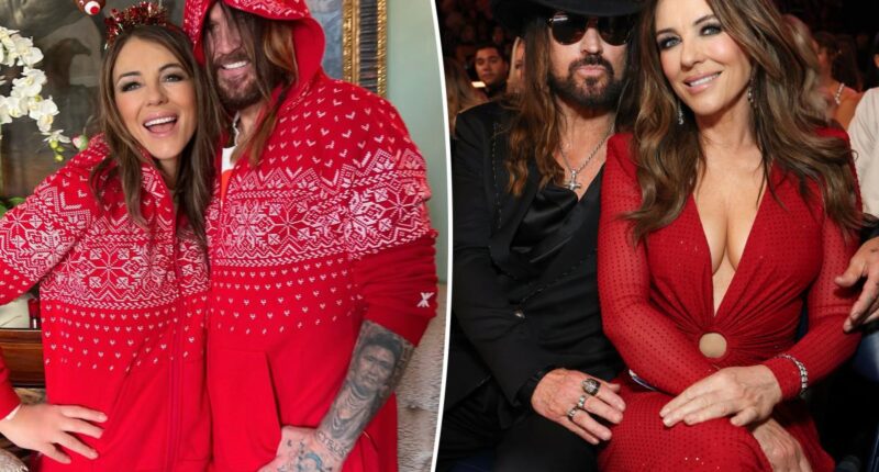 Billy Ray Cyrus and Elizabeth Hurley mark their first Christmas as a couple in matching onesie pajamas