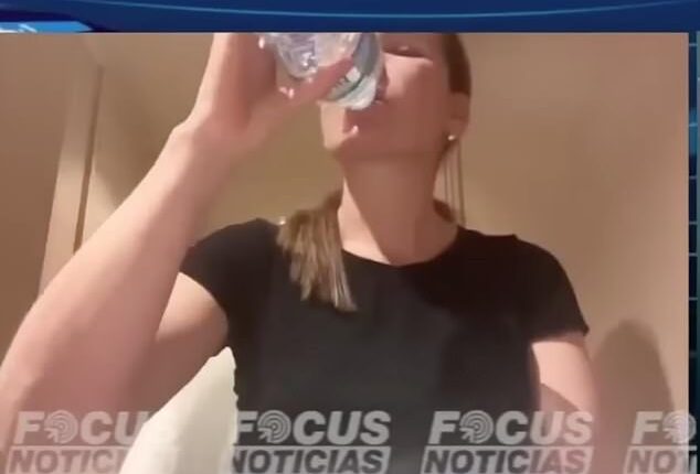 Zulma Guzman Castro drinks from a bottle of Buxton mineral water during an exclusive interview with Focus Noticias
