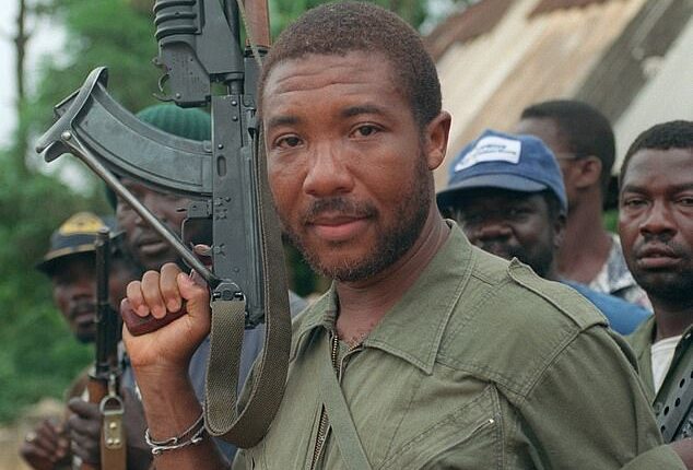 Charles Taylor in his days as a rebel leader in May 1990. Liberia still carries deep scars from the atrocities that were committed by fighters loyal to him and Doe