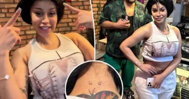 Cardi B gets wild new neck and back piercings — see the video