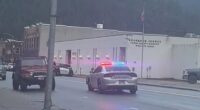 Pictured: There is a heavy police presence outside the Shoshone County Sheriff’s Office in Wallace, Idaho. Authorities have confirmed there is an active shooter situation