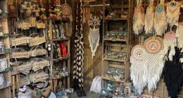 Christmas markets in the UK were once a great destination to find unique gifts from independent sellers - but now, they are more likely to sell 'overpriced tat' that can easily be found on Amazon, Temu and Etsy. Pictured, a stall at Leeds Christmas market